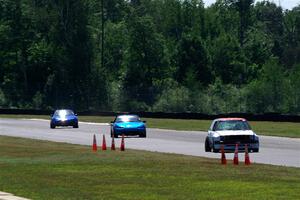 Brooke Fairbanks' H Production VW Golf with Rick Buan's and Luke Allen's Spec Miata Mazda Miatas