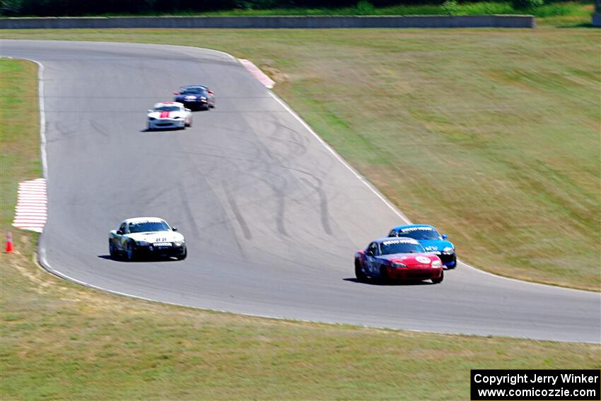 Chris Craft's, Kyle Greenhill's, Samantha Silver's, Shayne Sullivan's and Austin Pearce's Spec Miata Mazda Miatas
