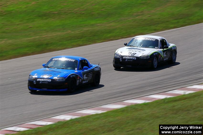 Kyle Greenhill's and Samantha Silver's Spec Miata Mazda Miatas