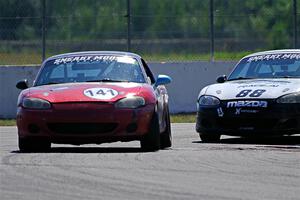 Chris Craft's and Samantha Silver's Spec Miata Mazda Miatas