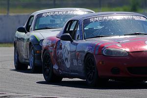 Chris Craft's and Samantha Silver's Spec Miata Mazda Miatas