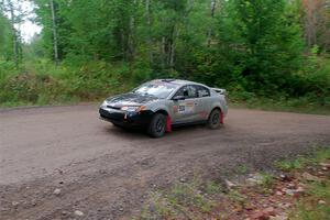 Gary Klein / Sam Strickhouser Saturn Ion Redline on SS3, Norway Home.
