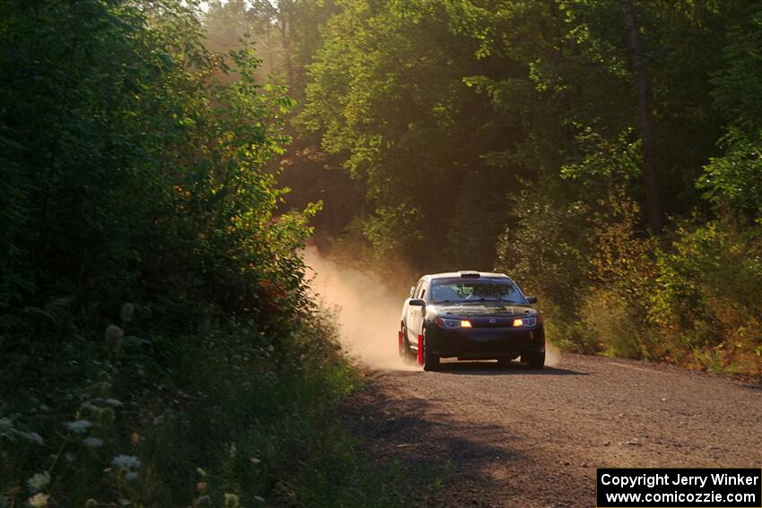 Gary Klein / Sam Strickhouser Saturn Ion Redline on SS6, Norway North.