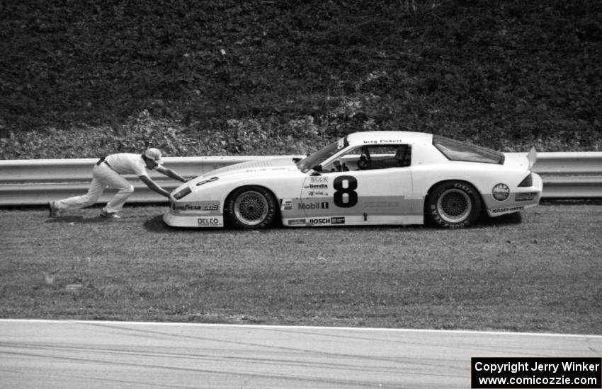 Greg Pickett's Chevy Camaro stops at turn 12