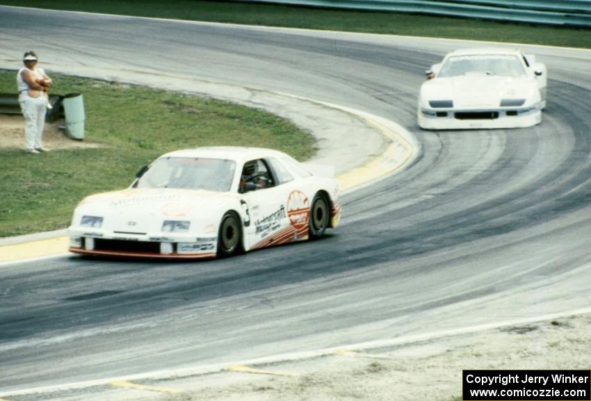 Pete Halsmer's Merkur XR4Ti and Wally Dallenbach's Chevy Camaro