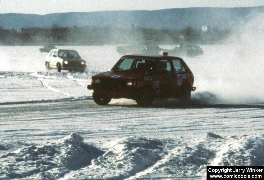 Randy Christman / Paul Hubenette VW GTI chased by the Kevin Carlstrom / Dan Otto VW GTI