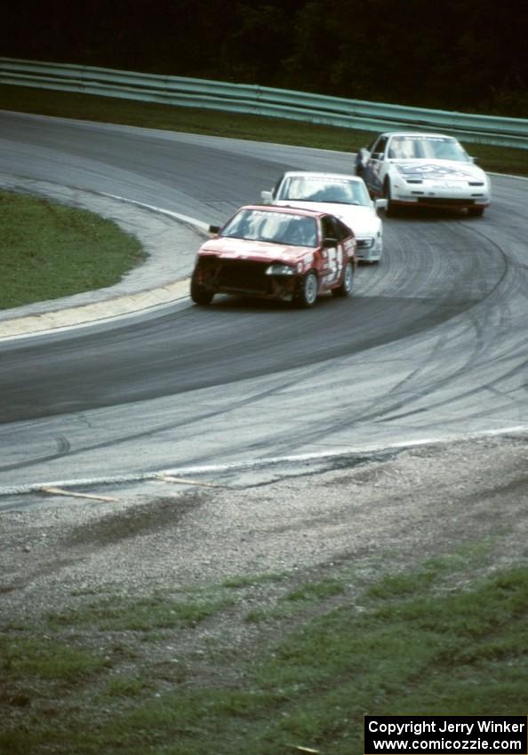 Norris Rancourt / John Green Honda CRX and a Porsche 944 and the Mark Stavros / Steve Sturges Nissan 300ZXT in Canada Corner