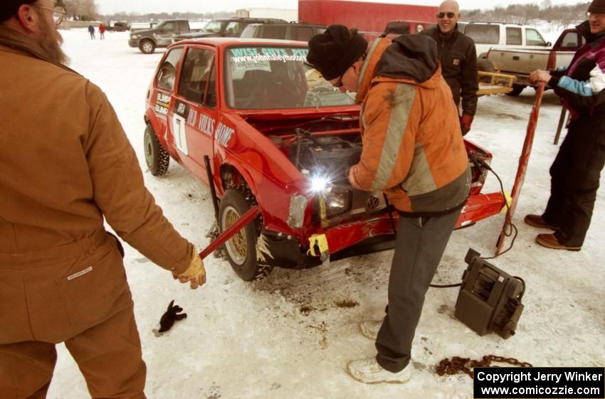 Work is performed to get the Dave Kapaun VW Rabbit ready for the enduro after crashing hard in the modified race.