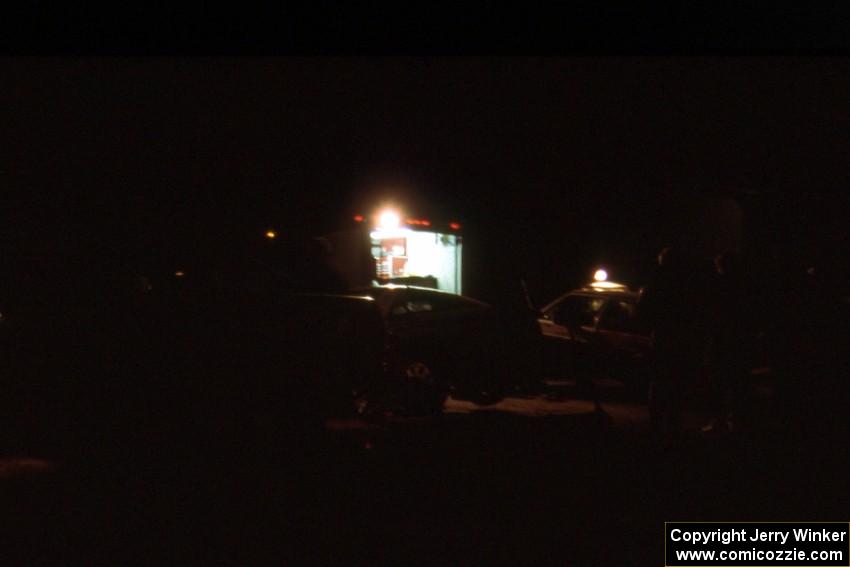 W.G. Giles / Bob Pierce VW GTI and Dick Corley / Lance Smith Mitsubishi Eclipse at night time L'Anse service.