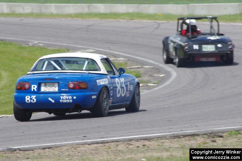 Zane Emstad's F Production Datsun SPL311 and Greg Blaser's Spec Miata Mazda Miata