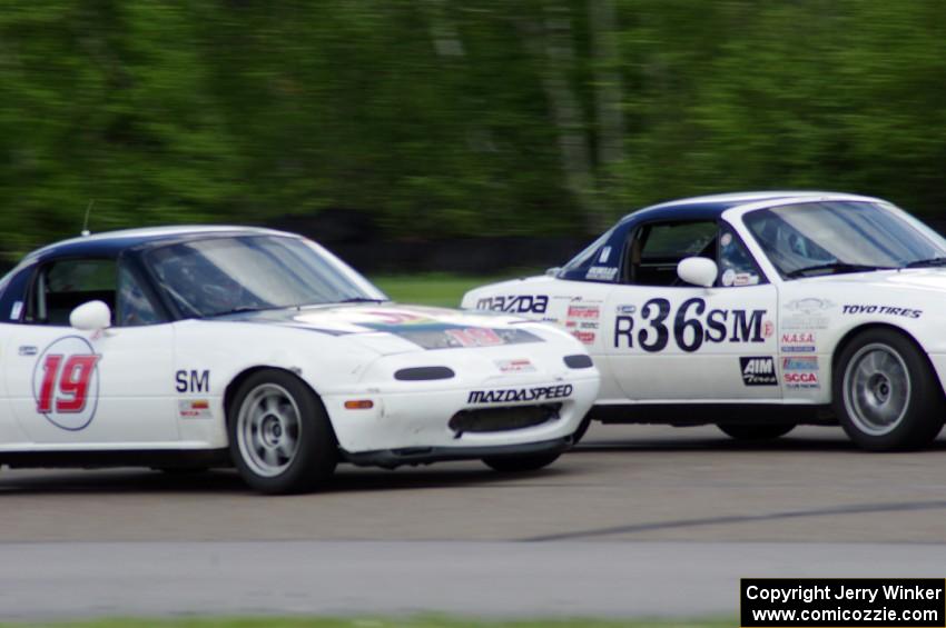 (19) Justin Elder's Spec Miata Mazda Miata and (36) Craig Silver's Spec Miata Mazda Miata