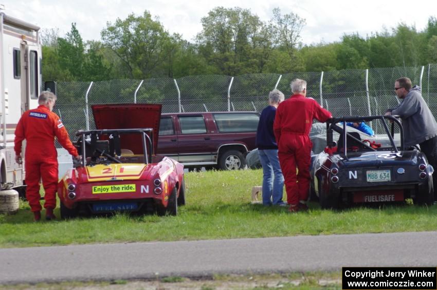 Don Haaversen's E Production Datsun 2000 and Zane Emstad's F Production Datsun SPL311 in the paddock