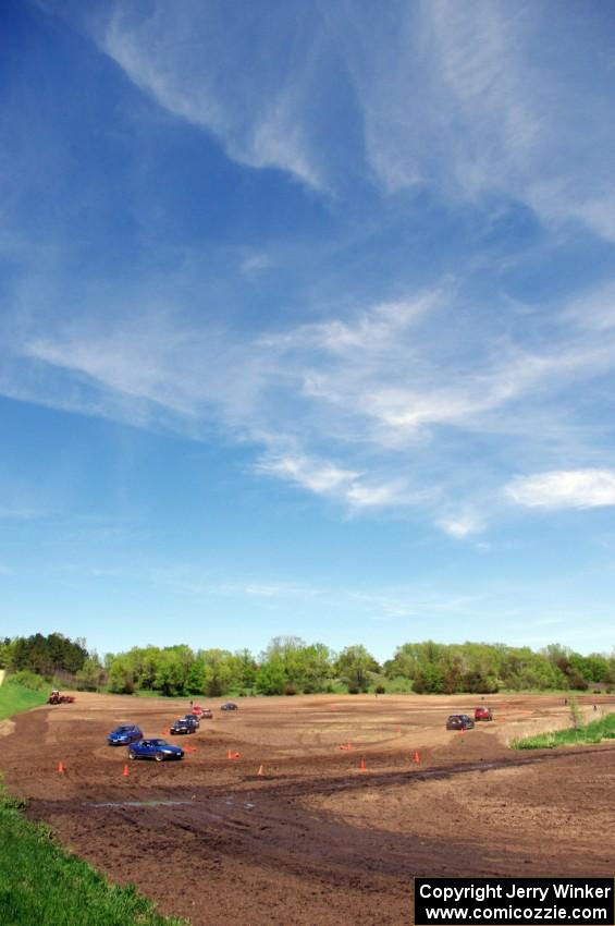 Cars navigate the course slowly before the next set of runs.