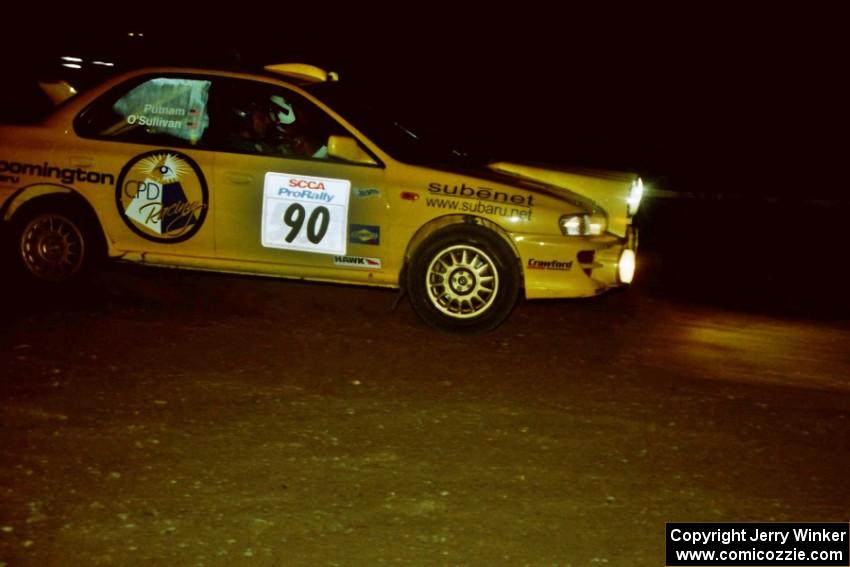 Lauchlin O'Sullivan / Scott Putnam Subaru Impreza at night on SS8, Flying Finnish.