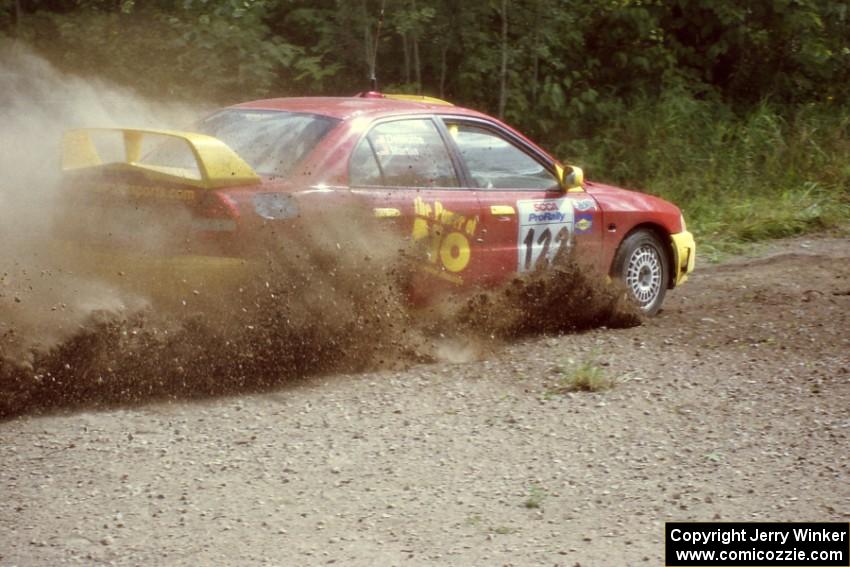 Dennis Martin / Kim DeMotte Mitsubishi Lancer Evo IV at the SS9 (Heart Lake) spectator area.