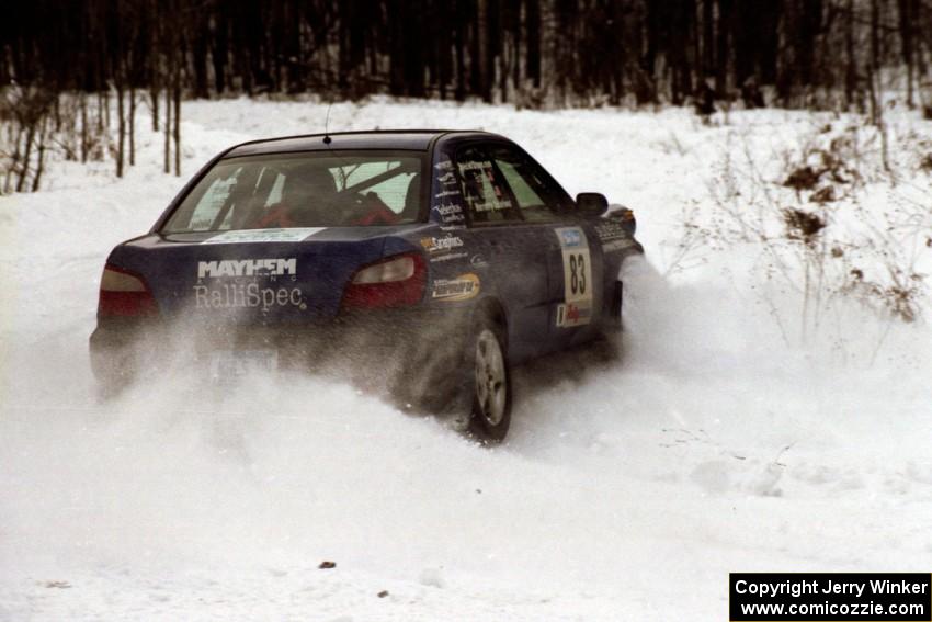 The Mark Utecht / Rob Bohn Subaru WRX clips a hard-right near the end of day two of the rally.