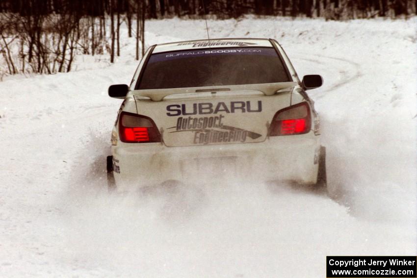 The Jonathan Bottoms / Carolyn Bosley Subaru WRX drifts nicely at a hard-right near the end of day two of the rally.