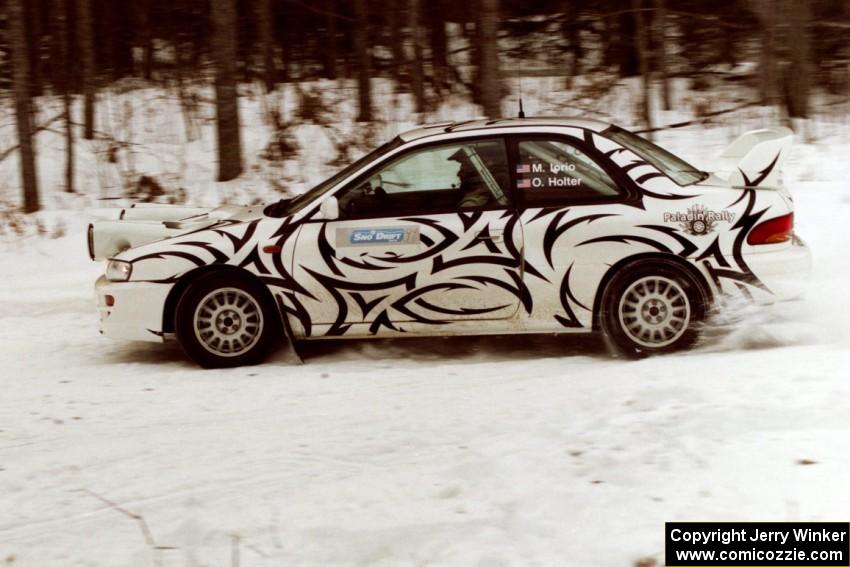 The Matt Iorio / Ole Holter Subaru Impreza lost its number-backer but sets up nicely for a hard-right near the end of the rally.