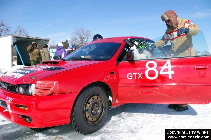 ??? straps into the Brent Carlson / Aaron Jongbloedt / Dave Steen, Jr. / Matt Shaffer Subaru Impreza