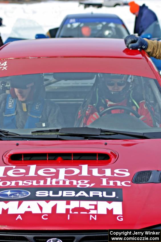 Brent Carlson rides shotgun with Matt Shaffer in the #84 Subaru Impreza