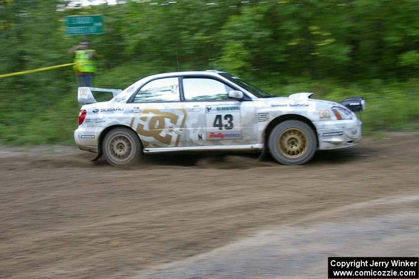 Ken Block / Alex Gelsomino Subaru WRX STi drifts wide at 90-right on SS2, Spur 2. They rolled and DNF'ed on the next stage.