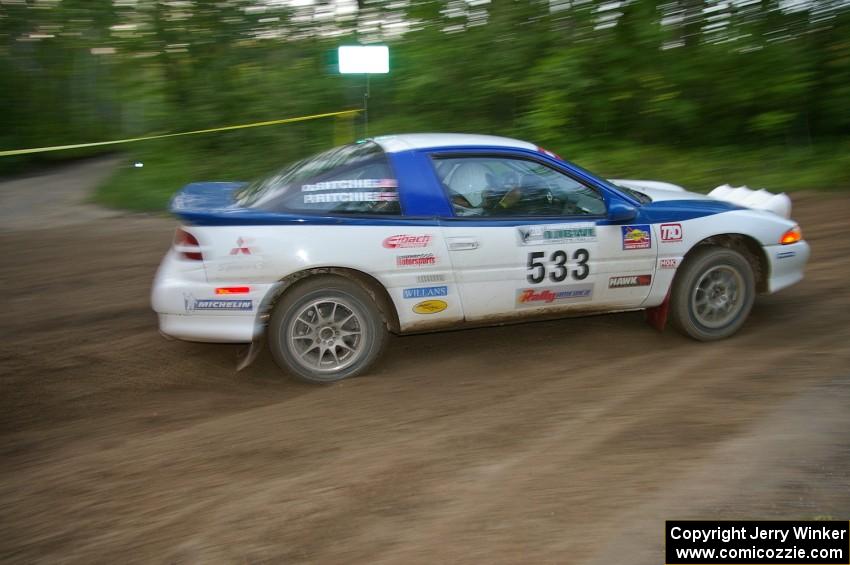 Paul Ritchie / Drew Ritchie Mitsubishi Eclipse GSX drifts through a 90-right on on SS2, Spur 2.