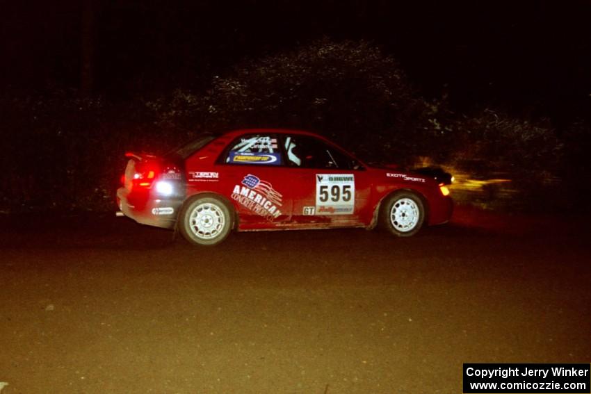 John Cirisan / Josh Hamacher Subaru WRX drifts through a 90-left on SS7, Blue Trail.