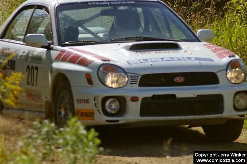 Dave Hintz / Rick Hintz Subaru WRX at speed on a straight on SS10, Chad's Yump.