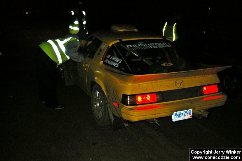 Jake Himes / Matt Himes Mazda RX-7 checks into the finish control of SS4, Baraga Plains.