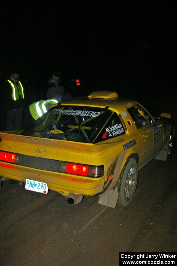 Jake Himes / Matt Himes Mazda RX-7 checks into the finish control of SS4, Baraga Plains.