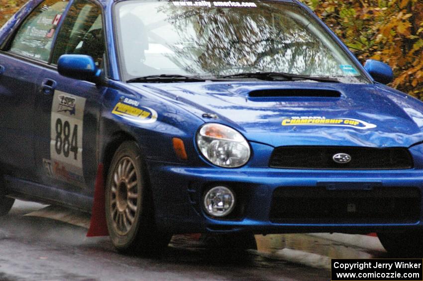 Tim Stevens / Jeff Hagan Subaru WRX takes it easy at the midpoint jump on Brockway, SS10.