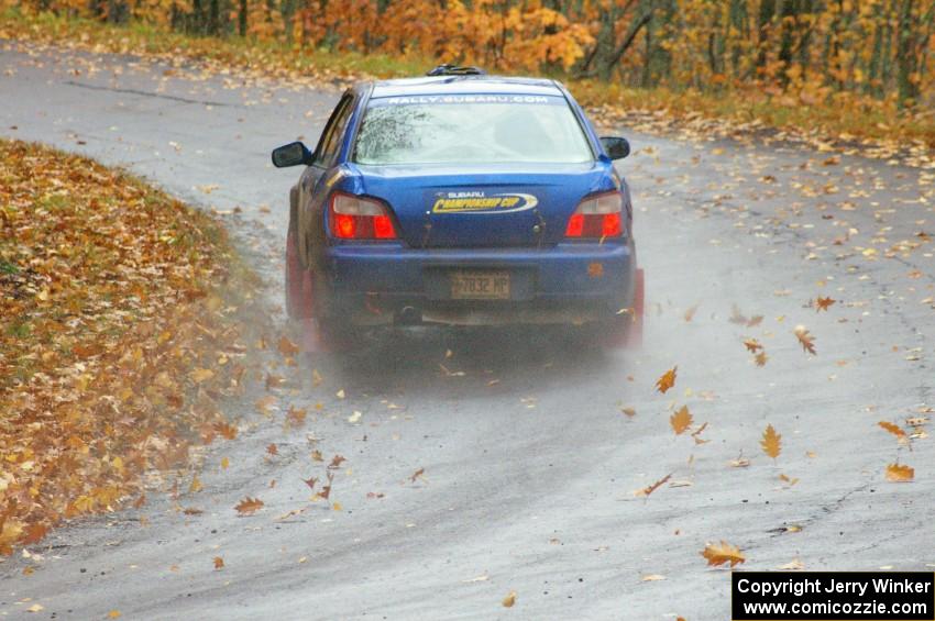 Tim Stevens / Jeff Hagan Subaru WRX kicks up leaves on the uphill-left after the midpoint jump on Brockway, SS10.