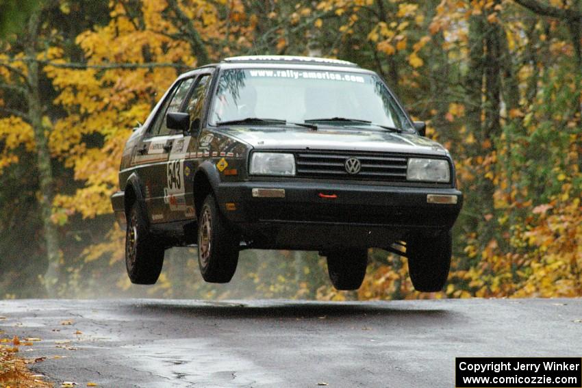 Mike Merbach / Jeff Feldt VW Jetta catches some nice air at the midpoint jump on Brockway, SS10.