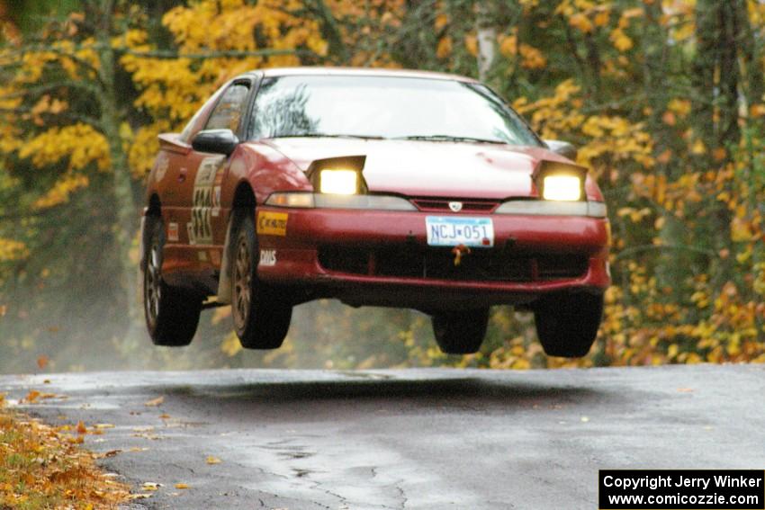 Dave LaFavor / Chris Huntington	Eagle Talon catches decent air at the midpoint jump on Brockway, SS10.