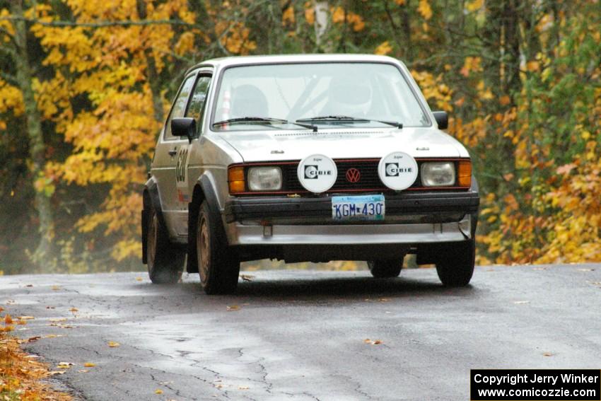 Chris Wilke / Mike Wren VW Rabbit keeps to the pavement at the midpoint jump on Brockway, SS10.