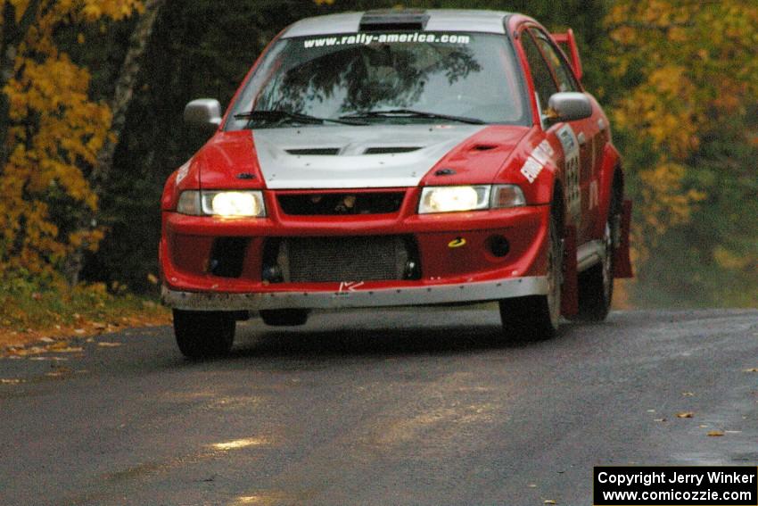 John Rek / Rob Dupree Mitsubishi Lancer Evo 6.5 keeps to the pavement at the midpoint jump on Brockway, SS10.