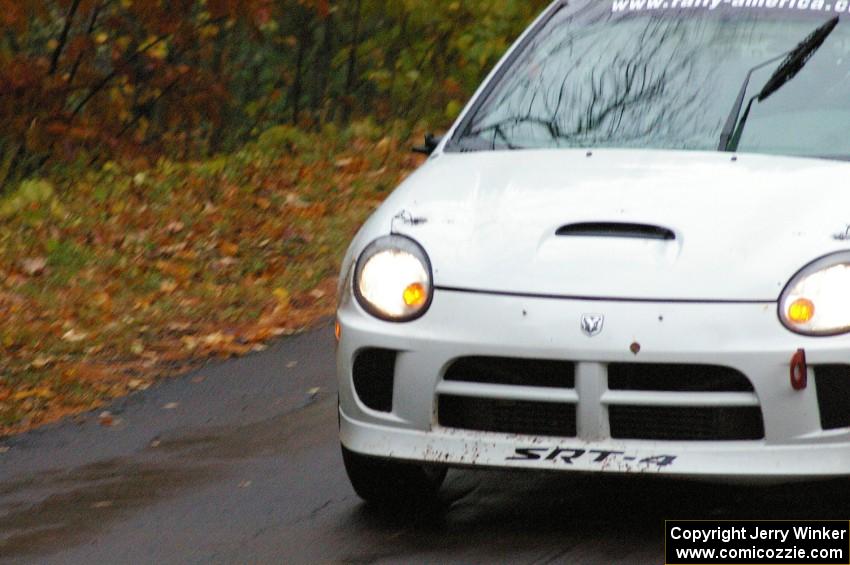 Ryan Haveman / Josh Van Den Heuvel Dodge Neon SRT-4 keeps it to the pavement at the midpoint jump on Brockway, SS10.