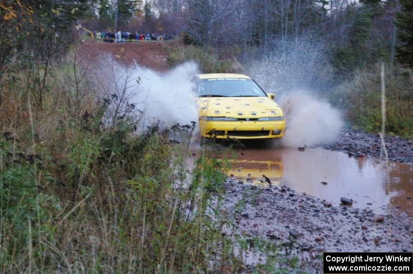 Kyle Sarasin / Stuart Sarasin Eagle Talon hits the final big puddle at the end of Gratiot Lake 2, SS14, at speed.