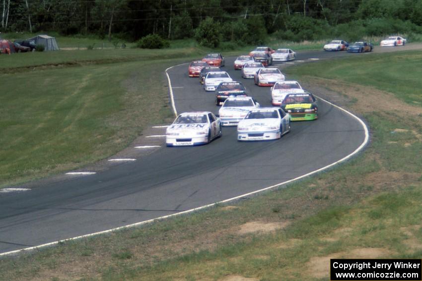 Leighton Reese's Chevy Lumina and Jimmy Spencer's Chevy Lumina front the pack through 7/8 during the first heat race.