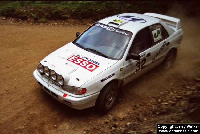 Dean Panton / David Watkins Hyundai Elantra at a 90-left on SS7, Wilson Run I.