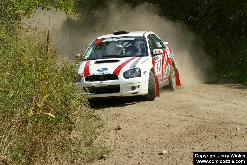 Greg Drozd / John Nordlie set up for a hard left-hander on SS9 in their Subaru WRX.