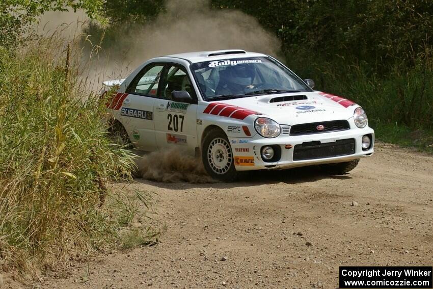 Dave Hintz / Rick Hintz set up for a left-hander on SS9 in their Subaru WRX.