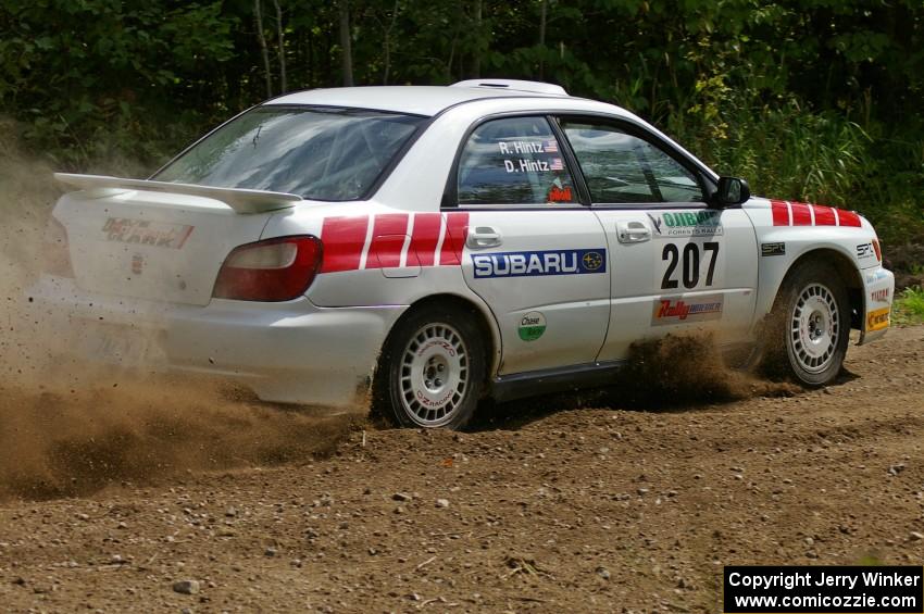 Dave Hintz / Rick Hintz reapply the throttle at a left-hander on SS9 in their Subaru WRX.