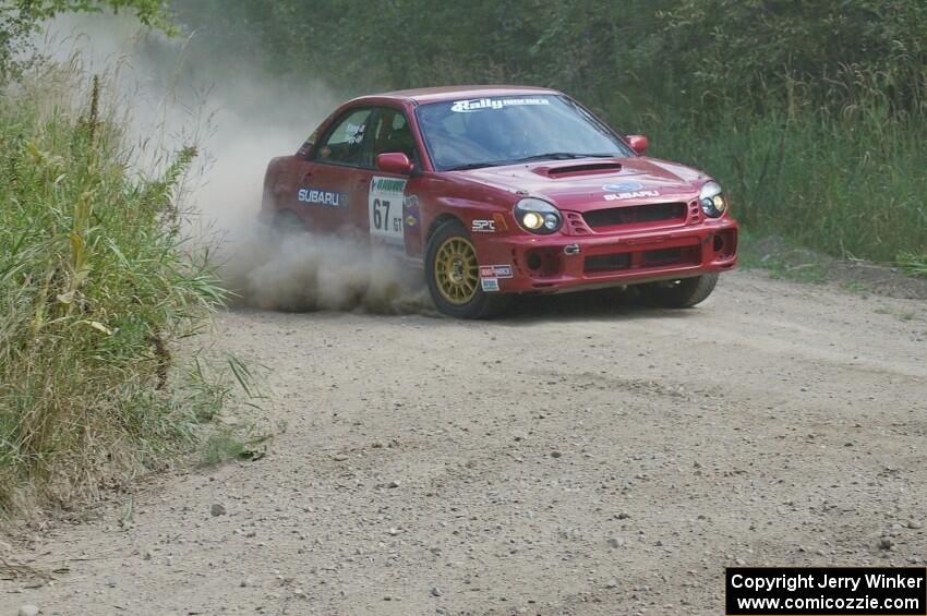 Bryan Pepp / Jerry Stang prepare for a 90-left on SS9 in their Subaru WRX.