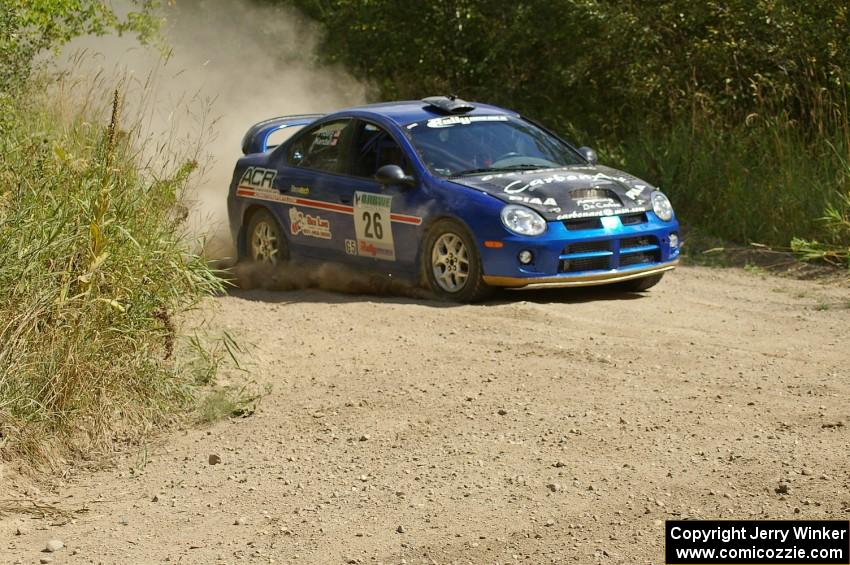 Cary Kendall / Scott Friberg Dodge SRT-4 prepares for a 90-left on SS9.