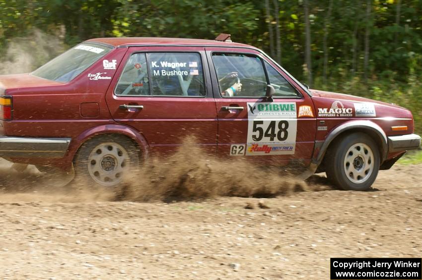 Matt Bushore / Karen Wagner power through a 90-left on SS9 in their VW Jetta.