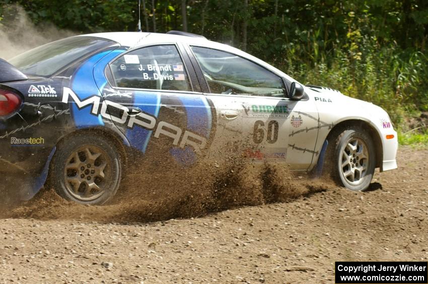 Bruce Davis / Jimmy Brandt power out of a hard-left on SS9 in their Dodge SRT-4.