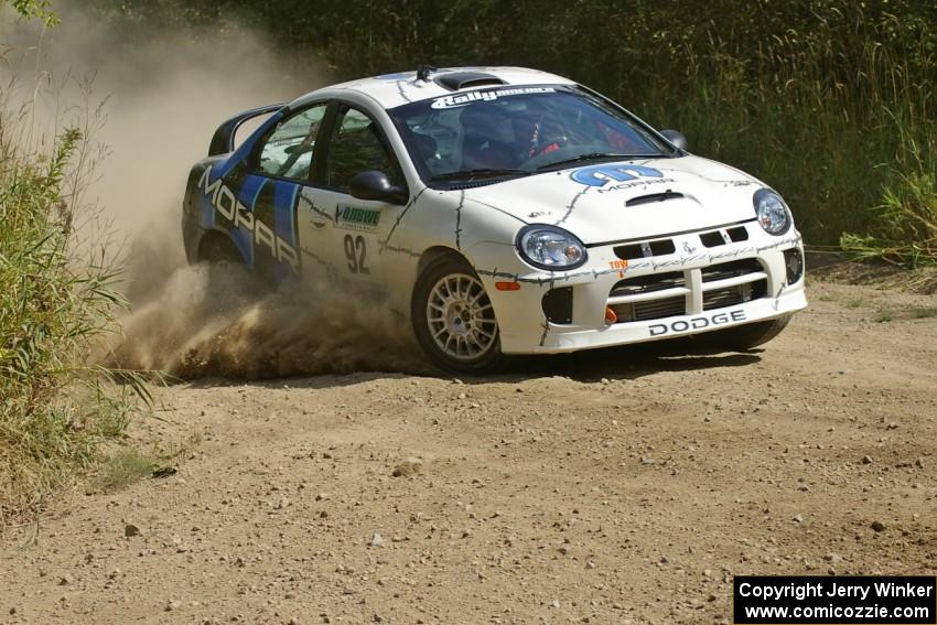 Paul Dunn / Bill Westrick start to reapply the power to their Dodge SRT-4 at a left-hander on SS9.