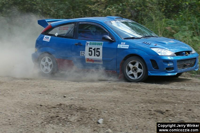 Adam Boullion / Phil Boullion Ford Focus at a hard left-hander on SS9.