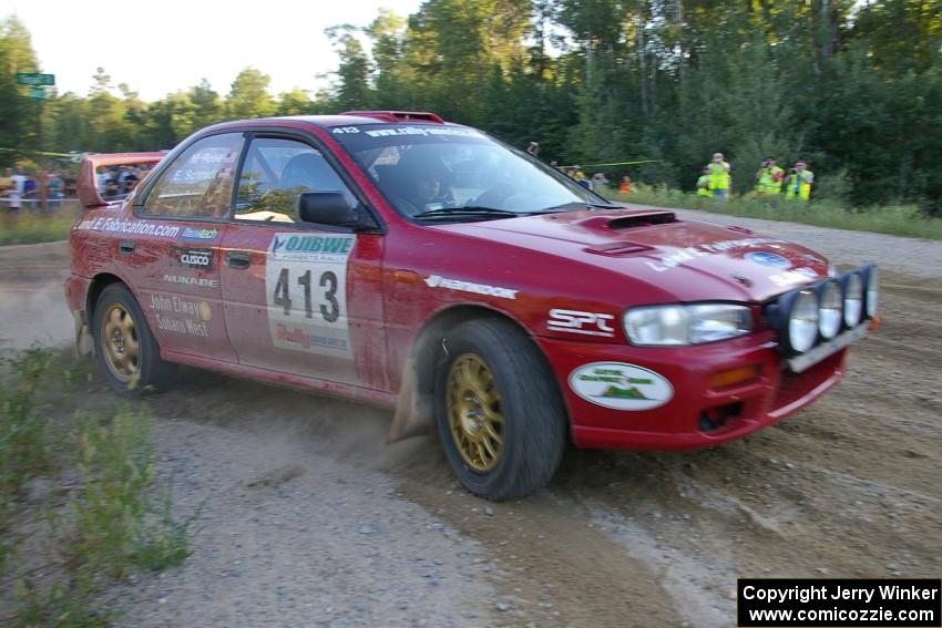 Erik Schmidt / Mike Rose at the spectator point on SS14 in their Subaru Impreza.